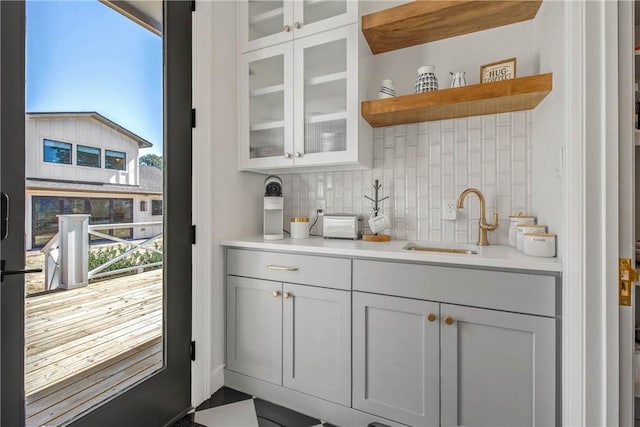 315 Suffolk Ave, College Station, TX 77840 - bar featuring tasteful backsplash and a sink