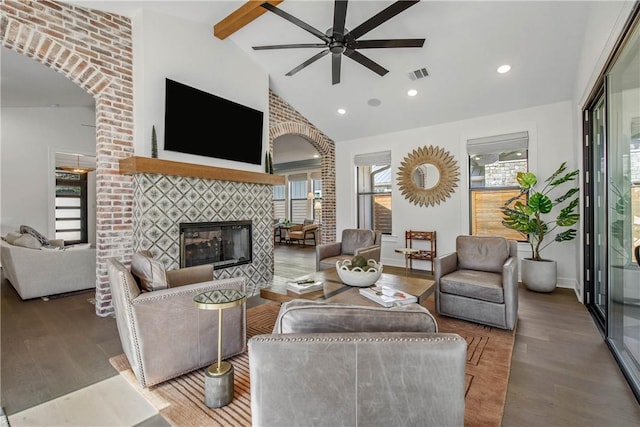 315 Suffolk Ave, College Station, TX 77840 - living room featuring visible vents, a healthy amount of sunlight, a fireplace, and wood finished floors