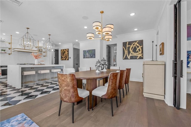315 Suffolk Ave, College Station, TX 77840 - dining area with visible vents, a notable chandelier, wood finished floors, recessed lighting, and crown molding
