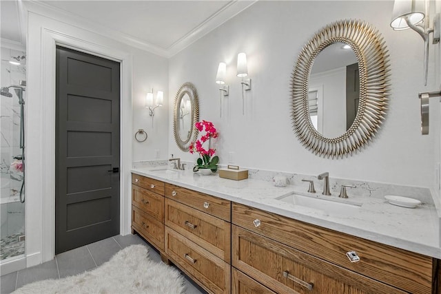 315 Suffolk Ave, College Station, TX 77840 - bathroom with a sink, a marble finish shower, crown molding, and tile patterned flooring