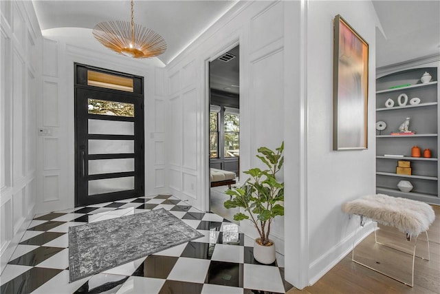 315 Suffolk Ave, College Station, TX 77840 - entryway with visible vents, baseboards, and a decorative wall