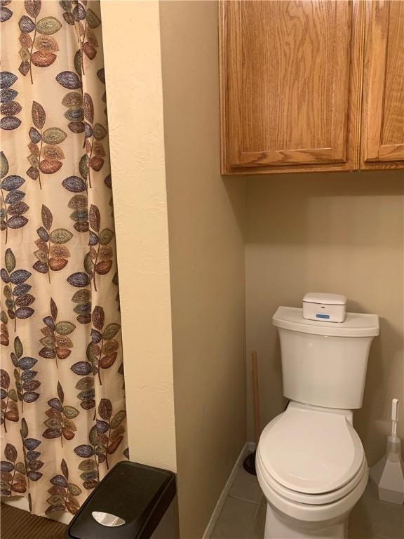 1707 Shawnee St, Navasota, TX 77868 - bathroom with vanity and baseboards
