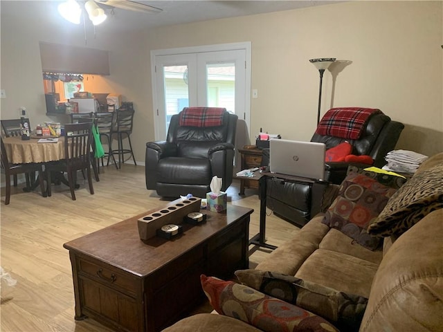 1707 Shawnee St, Navasota, TX 77868 - living area featuring wood finished floors, ceiling fan, and french doors