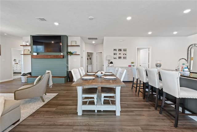 1988 Chief St, Bryan, TX 77807 - dining area featuring recessed lighting, dark wood-style flooring, and baseboards