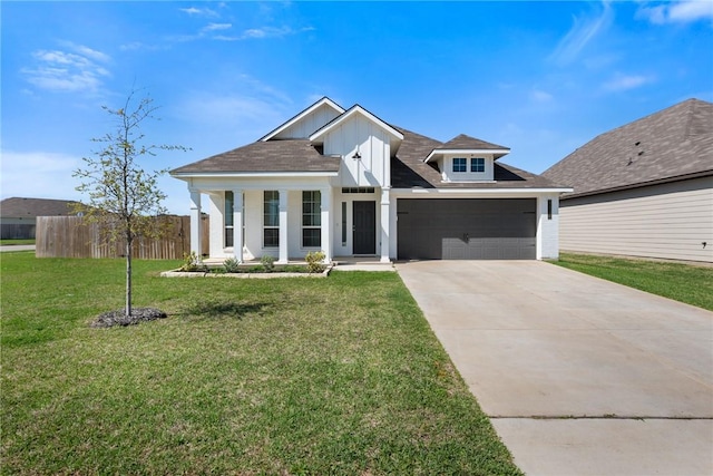 1988 Chief St, Bryan, TX 77807 - view of front of house featuring concrete driveway, an attached garage, and board and batten siding