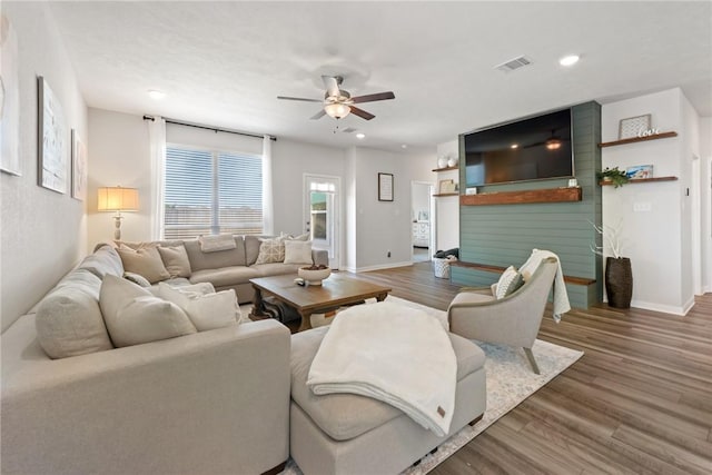 1988 Chief St, Bryan, TX 77807 - living area featuring a ceiling fan, wood finished floors, baseboards, and recessed lighting
