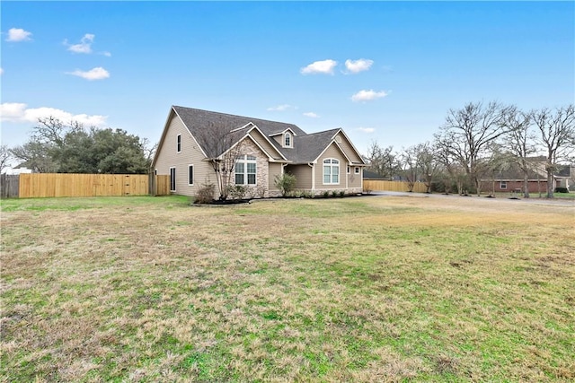 view of front of home with a front yard