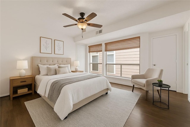 1536 Wolf Run, College Station, TX 77840 - bedroom featuring dark wood-type flooring, baseboards, and ceiling fan