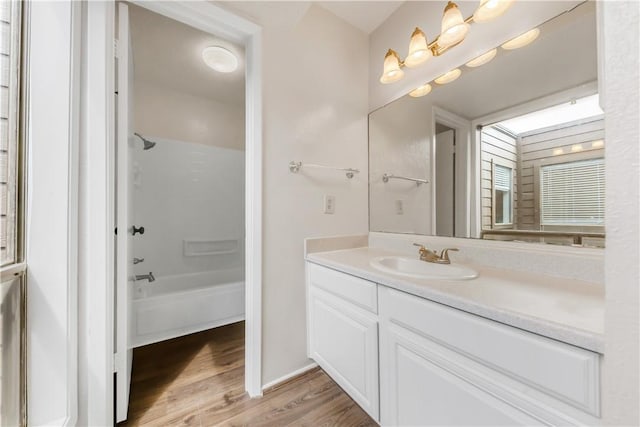 1536 Wolf Run, College Station, TX 77840 - bathroom with wood finished floors, vanity, and shower / tub combination