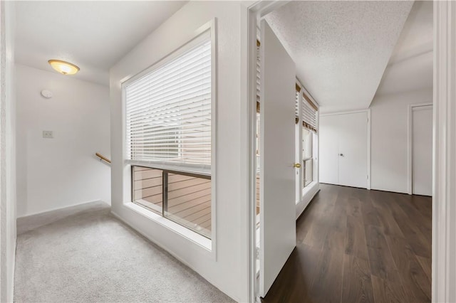 1536 Wolf Run, College Station, TX 77840 - corridor featuring an upstairs landing and baseboards