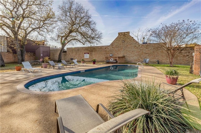 1536 Wolf Run, College Station, TX 77840 - view of swimming pool with a patio