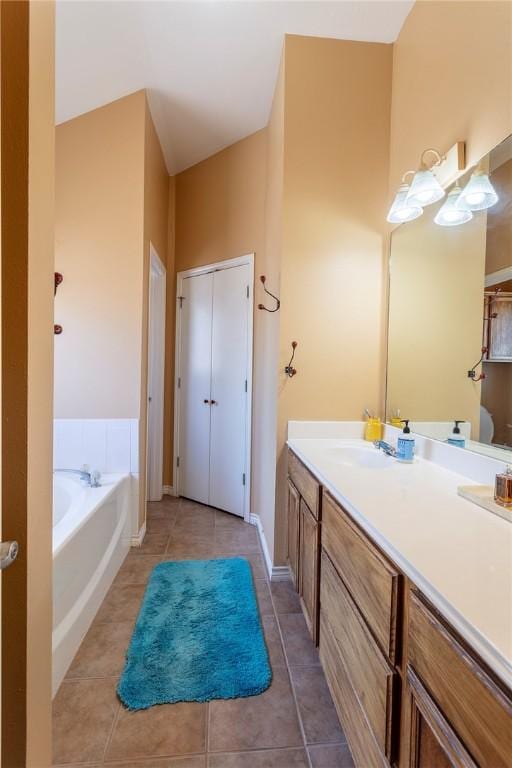 1701 Bradley Rd, College Station, TX 77845 - full bath featuring vanity, a bath, and tile patterned floors