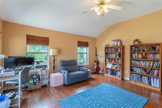 1701 Bradley Rd, College Station, TX 77845 - office area featuring wood finished floors, vaulted ceiling, a ceiling fan, and baseboards