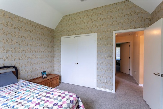 1701 Bradley Rd, College Station, TX 77845 - bedroom featuring vaulted ceiling, carpet, attic access, and a closet