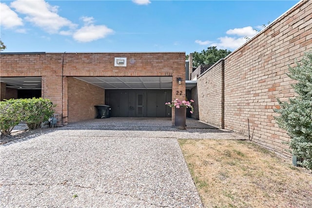 exterior space featuring a carport