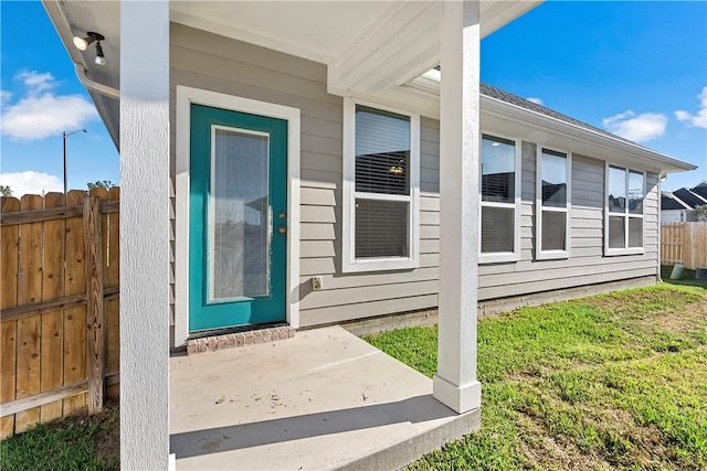 doorway to property featuring a patio area