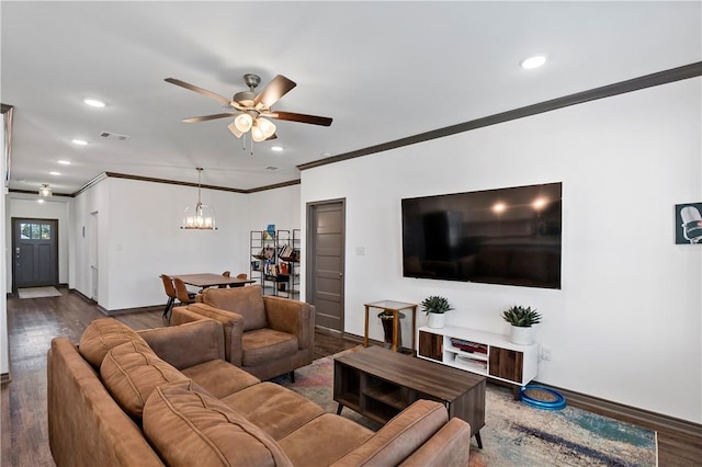 living room featuring crown molding, ceiling fan with notable chandelier, and dark hardwood / wood-style floors