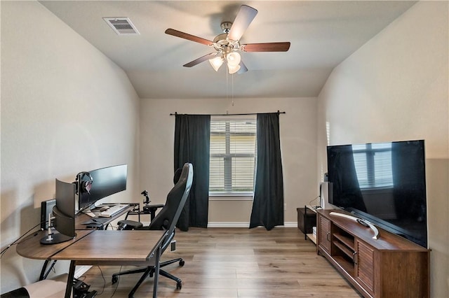 office area with ceiling fan, light hardwood / wood-style flooring, and lofted ceiling