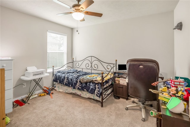 7906 Putter Pl, Navasota, TX 77868 - bedroom with carpet floors and a ceiling fan