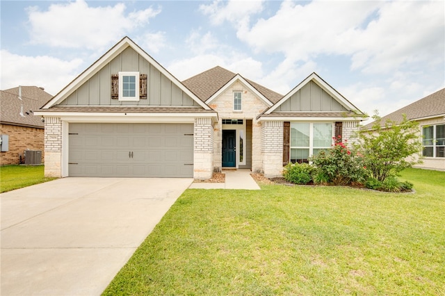 7906 Putter Pl, Navasota, TX 77868 - craftsman inspired home featuring board and batten siding, driveway, a front lawn, and brick siding