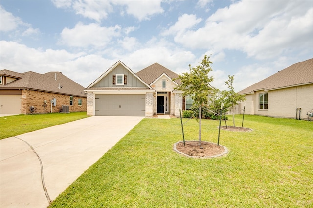 7906 Putter Pl, Navasota, TX 77868 - craftsman-style home featuring board and batten siding, brick siding, driveway, and a front lawn