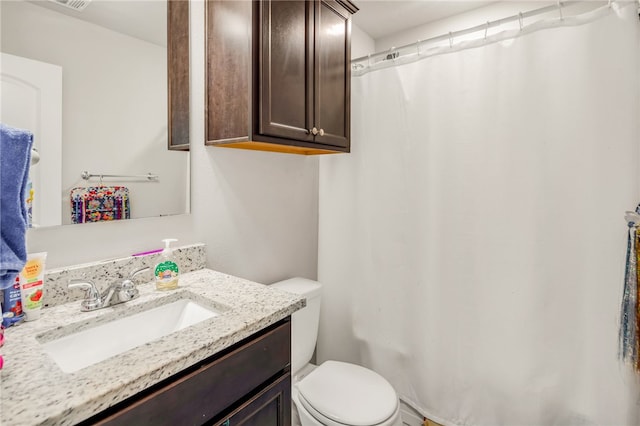 7906 Putter Pl, Navasota, TX 77868 - full bathroom with toilet, vanity, and a shower with curtain