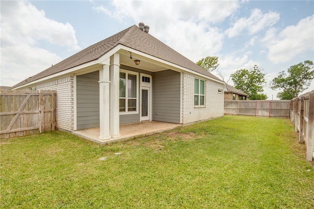 7906 Putter Pl, Navasota, TX 77868 - back of property featuring brick siding, a patio, and roof with shingles