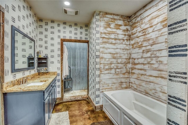 1850 Lcr 439, Groesbeck, TX 76667 - full bath with a garden tub, vanity, walk in shower, and concrete floors