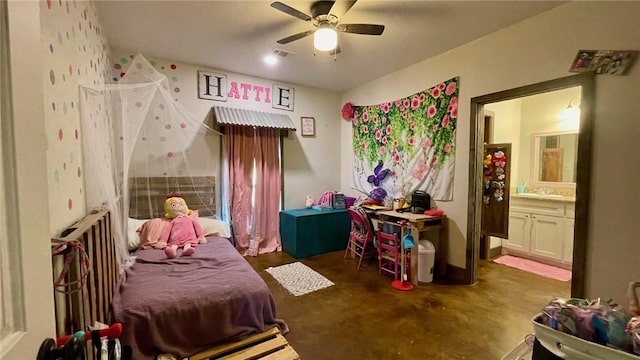 bedroom featuring ceiling fan, sink, and ensuite bathroom