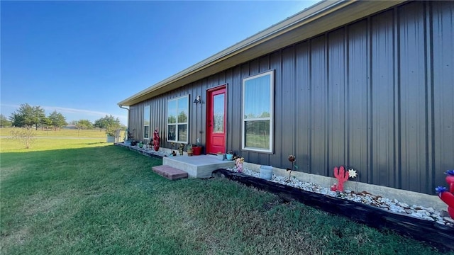 view of property exterior featuring a yard