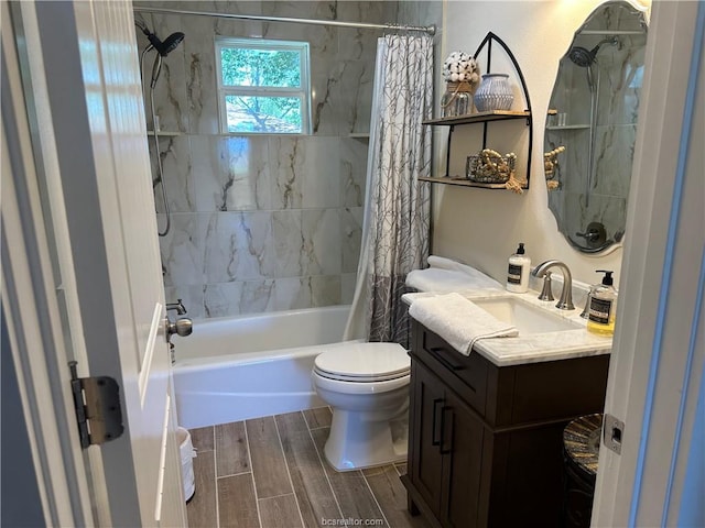 full bath featuring toilet, shower / tub combo, wood finish floors, and vanity