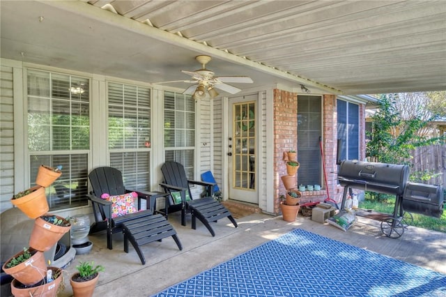 view of patio / terrace with ceiling fan and a grill