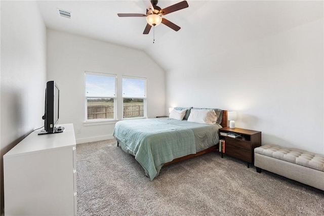 carpeted bedroom featuring lofted ceiling and ceiling fan