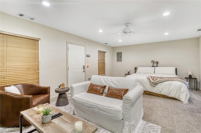 carpeted bedroom featuring visible vents, recessed lighting, electric panel, and a ceiling fan