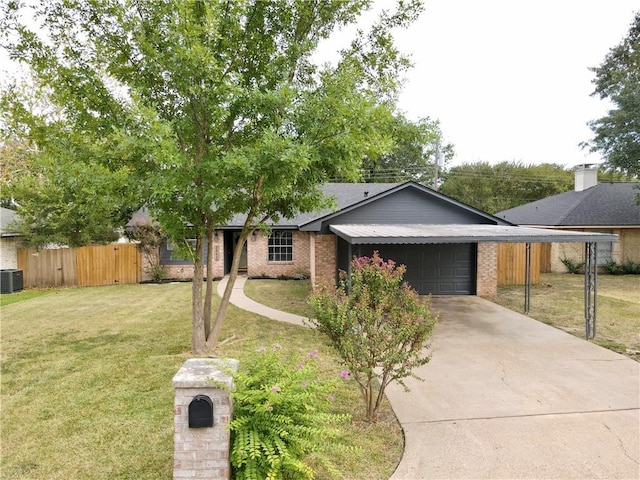 ranch-style house featuring a front yard, central AC unit, a garage, and a carport