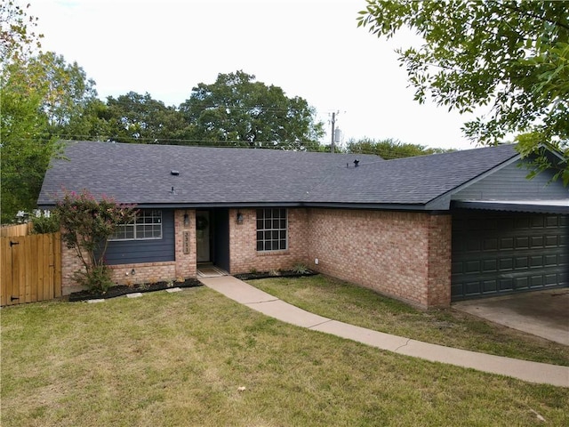 single story home with a garage and a front yard