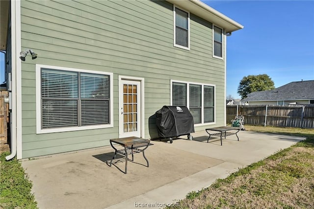 rear view of house with a patio