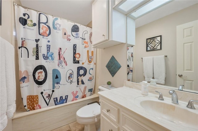 full bathroom with a skylight, shower / bathtub combination with curtain, tile patterned flooring, toilet, and vanity