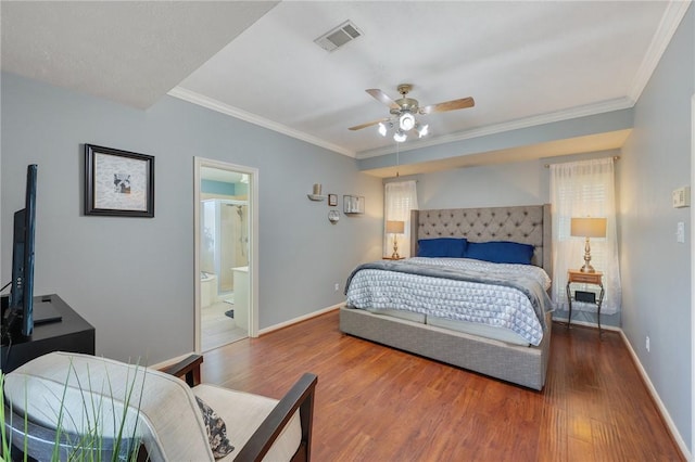 bedroom featuring hardwood / wood-style flooring, ceiling fan, ornamental molding, and ensuite bathroom