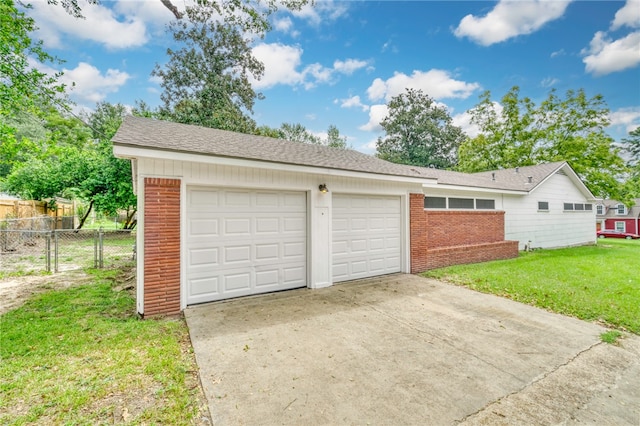 garage with a yard