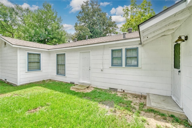 exterior space with a lawn