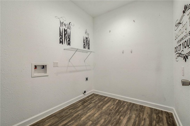 laundry room with dark wood-type flooring, baseboards, hookup for a washing machine, and laundry area
