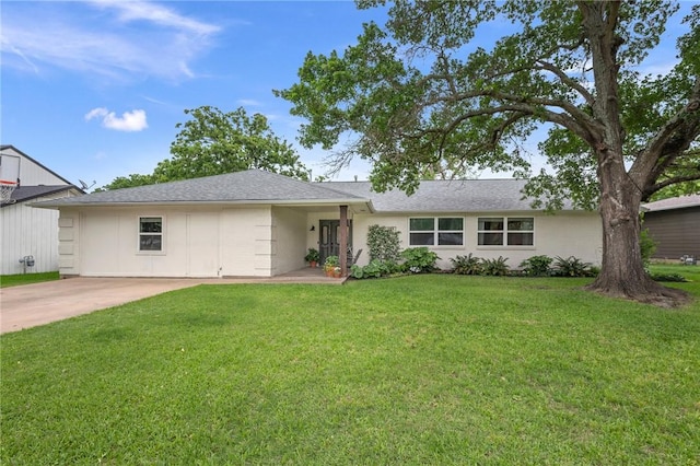 ranch-style home with a front lawn