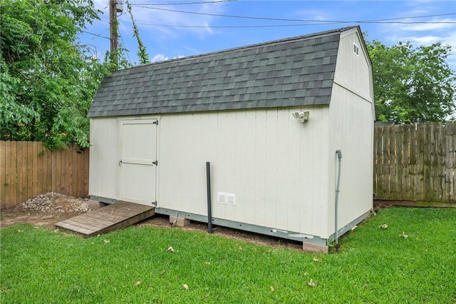 view of shed featuring a fenced backyard
