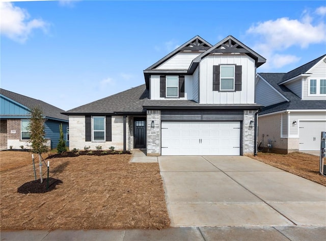 6434 Raleigh Loop, College Station, TX 77845 - view of front facade with board and batten siding, concrete driveway, and an attached garage