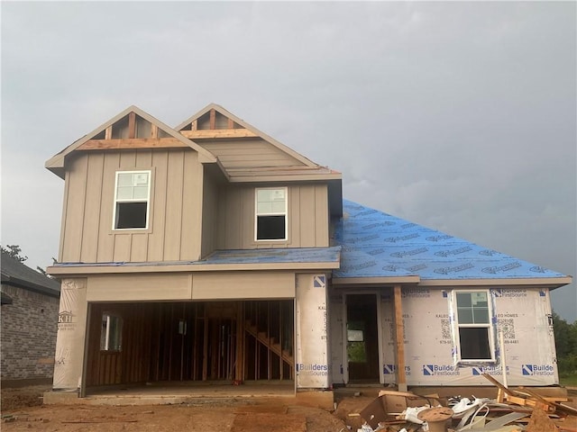 6434 Raleigh Loop, College Station, TX 77845 - view of front of home featuring an attached garage and board and batten siding
