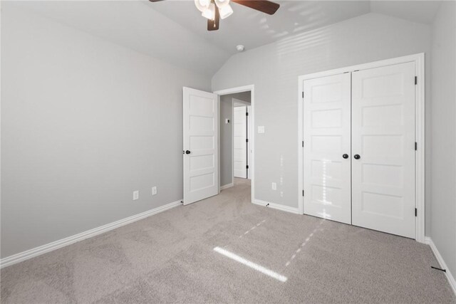 6434 Raleigh Loop, College Station, TX 77845 - unfurnished bedroom with lofted ceiling, carpet floors, a closet, and a ceiling fan