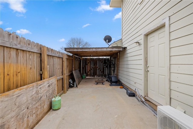 view of patio featuring ac unit