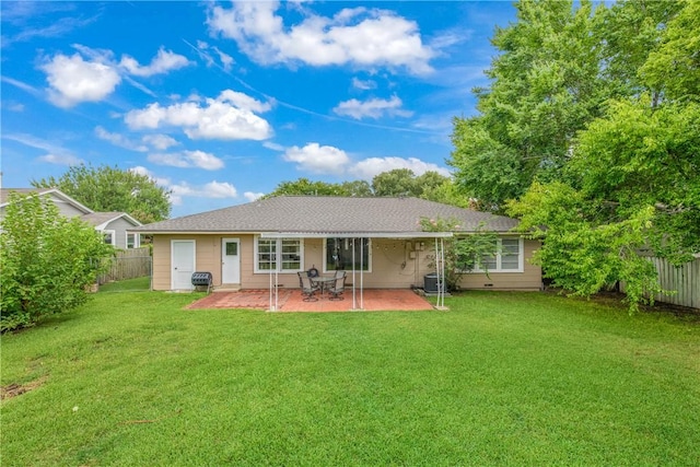 1103 Edgewood Dr, Bryan, TX 77802 - rear view of property with a patio area and a fenced backyard