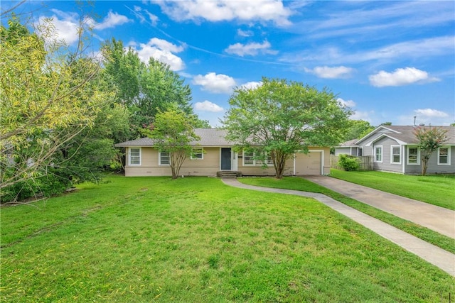 1103 Edgewood Dr, Bryan, TX 77802 - single story home with driveway, an attached garage, and a front lawn